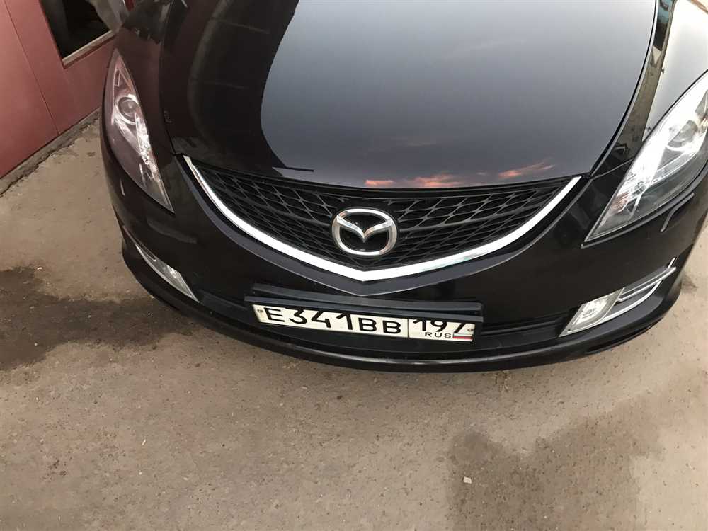 Какие модели Mazda могут быть оснащены откидными рамками номера